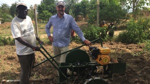 Brian Dyck developing the walking tractor for food security in Uganda.
